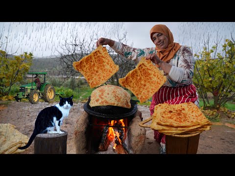 Fresh Moroccan Wheat Loafs on the Wood Stove in a Mountain Village