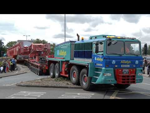 Super sized 706 tonne transport crosses bridge in town centre; police clear people and traffic
