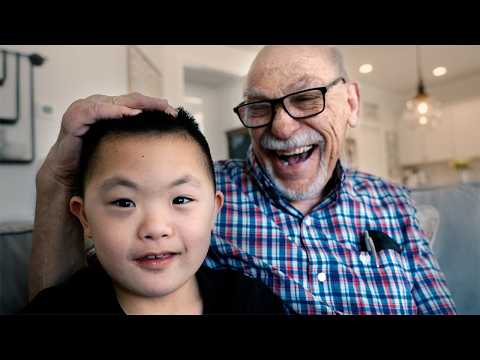 Family adopts boy with Down syndrome from China, grandpa has cerebral palsy, their bond is beautiful