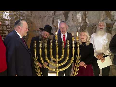 Prime Minister Netanyahu lighting the second Hanukkah candle with IDF soldiers at the Western Wall