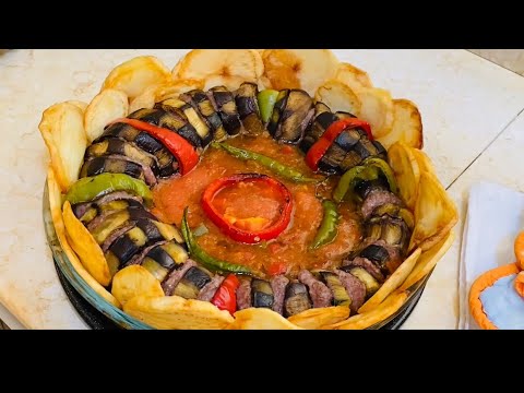 كباب باذنجان ولكن بطريقتي بجانبها رز طعم يفوق الخيال يطلب مني دائماً بدون ملل