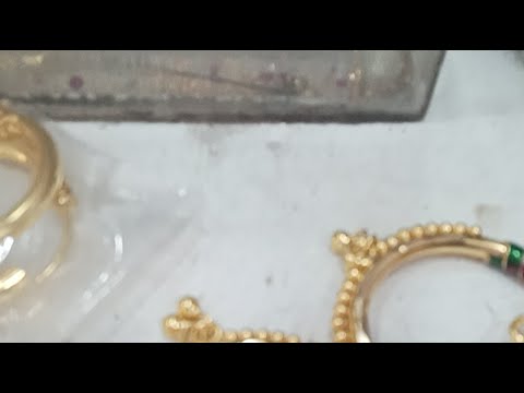 cutting and designing on gold earrings