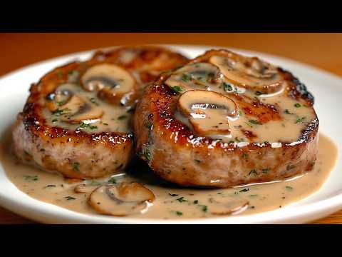This recipe will drive you crazy! Pork steaks in a creamy garlic sauce with mushrooms!