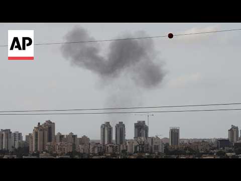 Black smoke rises from factory hit by Iran missile fragment in Israel