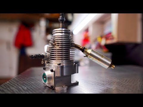 Unusual 4-stroke engine - WITHOUT VALVES the sleeve rotates What kind of beast is this ???