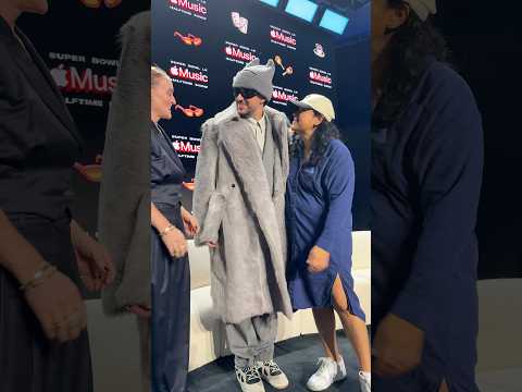Photo op of ￼￼Bad Bunny at the Apple Music halftime show press conference.