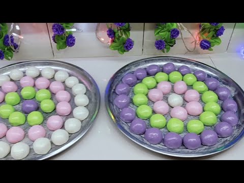 Black sesame and peanut glutinous rice balls!! Absolutely delicious!! The flavor lingers in your ...