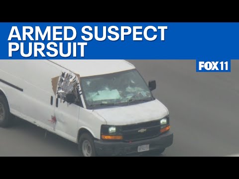 LAPD in pursuit of armed suspect in San Fernando Valley
