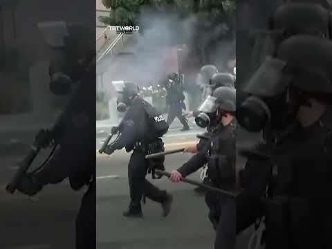 Police unleash tear gas as ICE raid protests erupt in LA