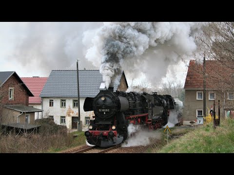 Heavy cement train with two steam locomotives - 52 8029 + 52 8047 on the inclines around Nossen