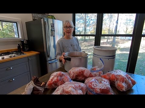 Canning frozen tomatoes. A great way to process the harvest on your own schedule.