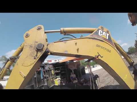 Cat back hoe side crack