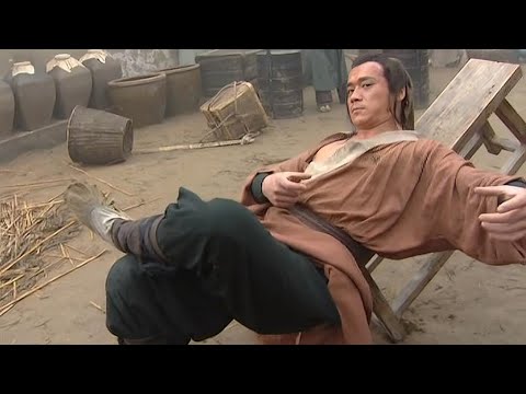 A filthy drunk is actually a kung fu master, whose iron fists smash through the whole street.