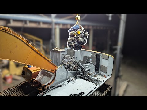 Installing the engine and hydraulic pump into an excavator - Hitachi EX120-2