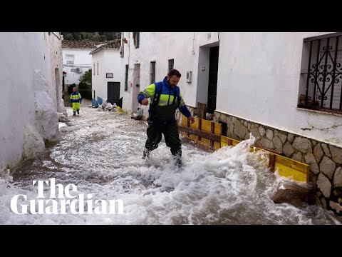 Residents watch torrents of rainwater tear through Spanish village of Ubrique