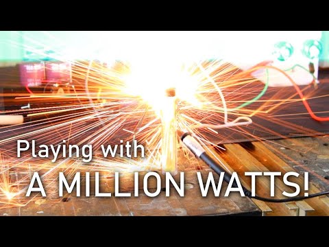 High Voltage Capacitor Bank DESTRUCTION: Explosions, EMP, and SLOW MOTION! | Megawatt Pulser Part 2