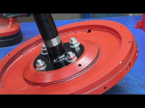 What happens if you combine the old fly wheel and the engine from the washing machine?