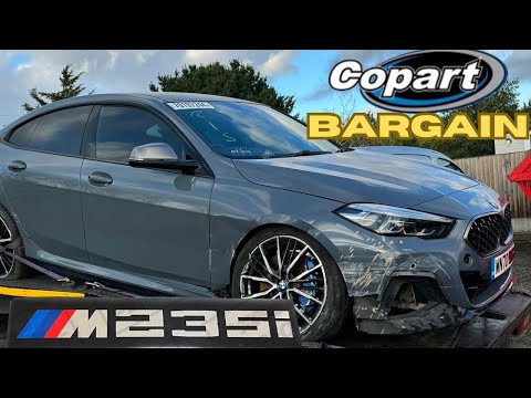 WE BOUGHT A CRASH DAMAGED BMW M235i FROM COPART SALVAGE AUCTION