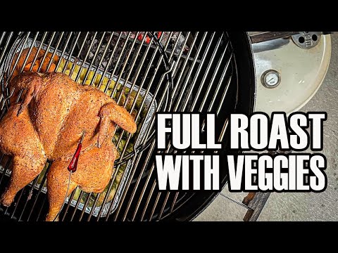 Full roast chicken in Weber kettle with roasted vegetables