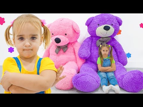 Alice and Nicole learn to share new toys