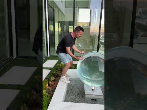 These features make your yard an experience! #luxuryhome #backyard #landscapedesign #waterfeatures