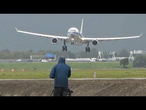 CROSSWIND LANDINGS during a STORM at AMSTERDAM - BOEING 747 Go Around, A380, A330 & more (4K)