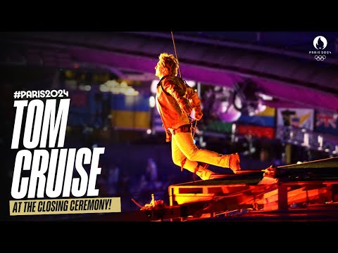 Tom Cruise abseils from the stadium roof, and rides off on a motorbike! | #Paris2024