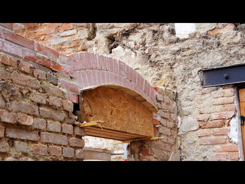 Building an arch, reluctantly.