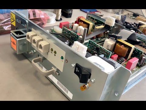 Repair of a DEC VAX4000 power supply (PWJ248)