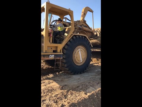 Open Cab Scraper Push Loads