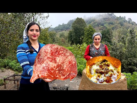 Cooking beef hump under rice in a rustic kitchen