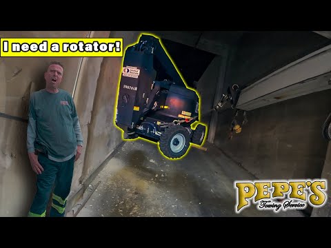 Boom lift truck CRASHED into wall and gets stuck
