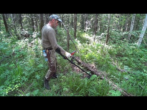 I'M WALKING THROUGH FOREST CUTTINGS FROM THE 70s, LOOKING FOR ALL KINDS OF TRACTOR PARTS. I'M STO...