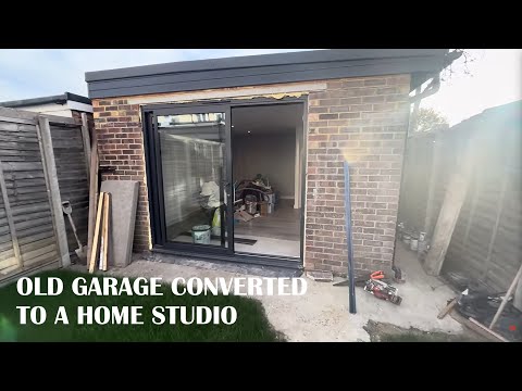 Transforming an old garage into a home studio with a toilet room