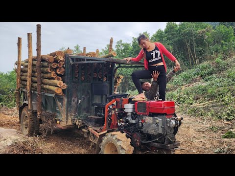 agricultural vehicle transporting timber navigates extremely dangerous dirt roads.