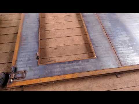 Гаражные ворота (утепленные, с контейнерным запором). Garage Doors (insulated, with container lock)