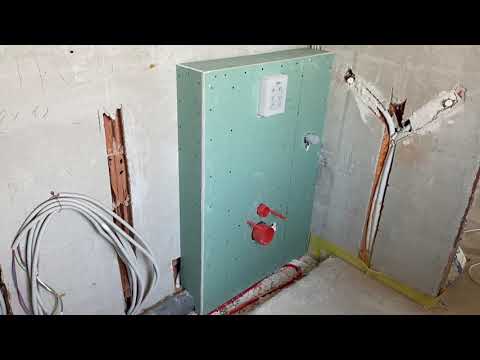 How to cover an installation with plasterboard in two layers.