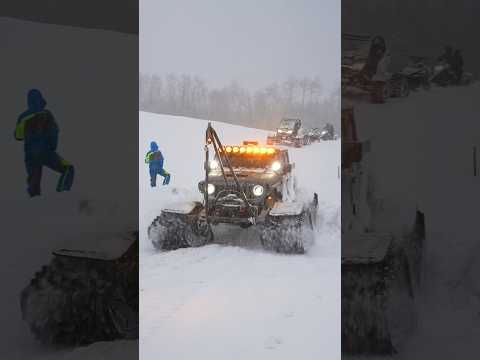 Towing a Lost Snowmobile in a Blizzard