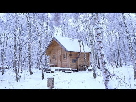 frozen log cabin in wilderness, -18 winter overnight with new wooden stove