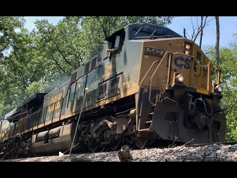 CSX 542 leads an east bound freight train with 2 DPUs