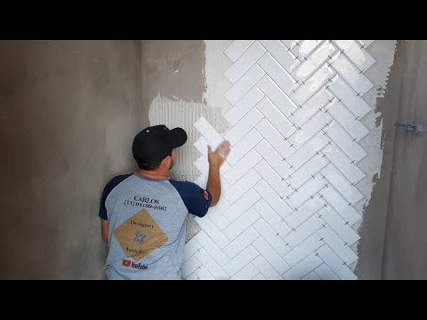 Herringbone subway, look how easy it is and look how the bathroom looks.