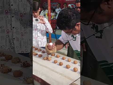 Smashing walnuts with an egg in hand 😱
