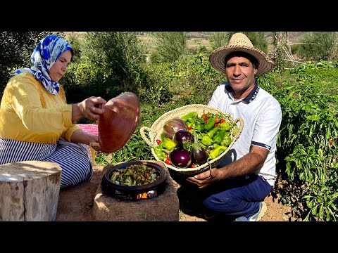 جني خضروات الحديقة وإعداد وجبة الزعلوك فوق الحطب