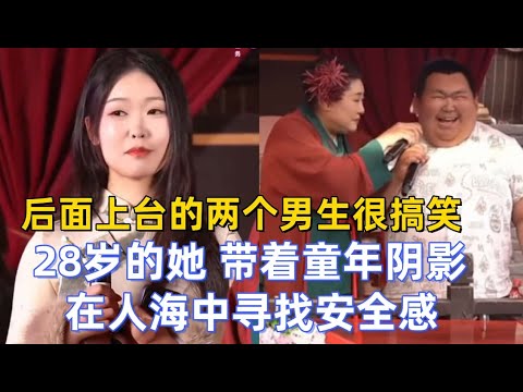 She,carrying the shadows of her childhood, seeks a sense of security in the crowd.