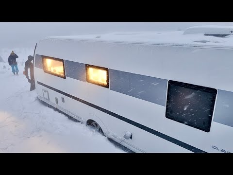 CAMPING UNDER HEAVY SNOWSTORM IN A HOME COMFORT CARAVAN