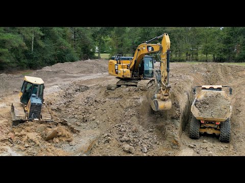 Digging a pond expansion. Doubling the size of the current pond.