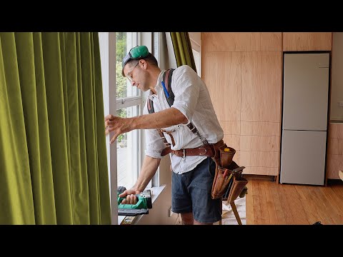 Green Velvet Curtains, Natural Timber, Windows and a Garden