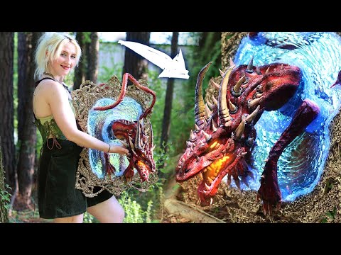 I sculpted a dragon coming through a mirror portal  🪞🐉