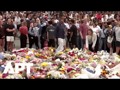Flowers, Candles and Menorahs as Sydney Mourns Victims of Deadly Bondi Beach Shooting | APT