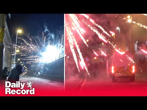 Birmingham turns into a war zone as police and public bombarded with fireworks and flares
